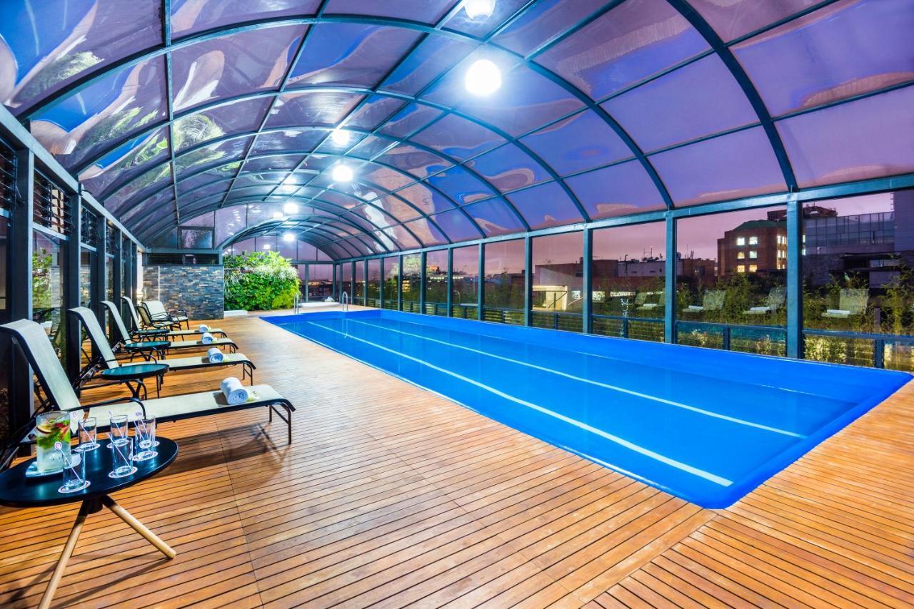 科斯莫斯100号酒店及会议中心 波哥大 外观 照片 A pool enclosure