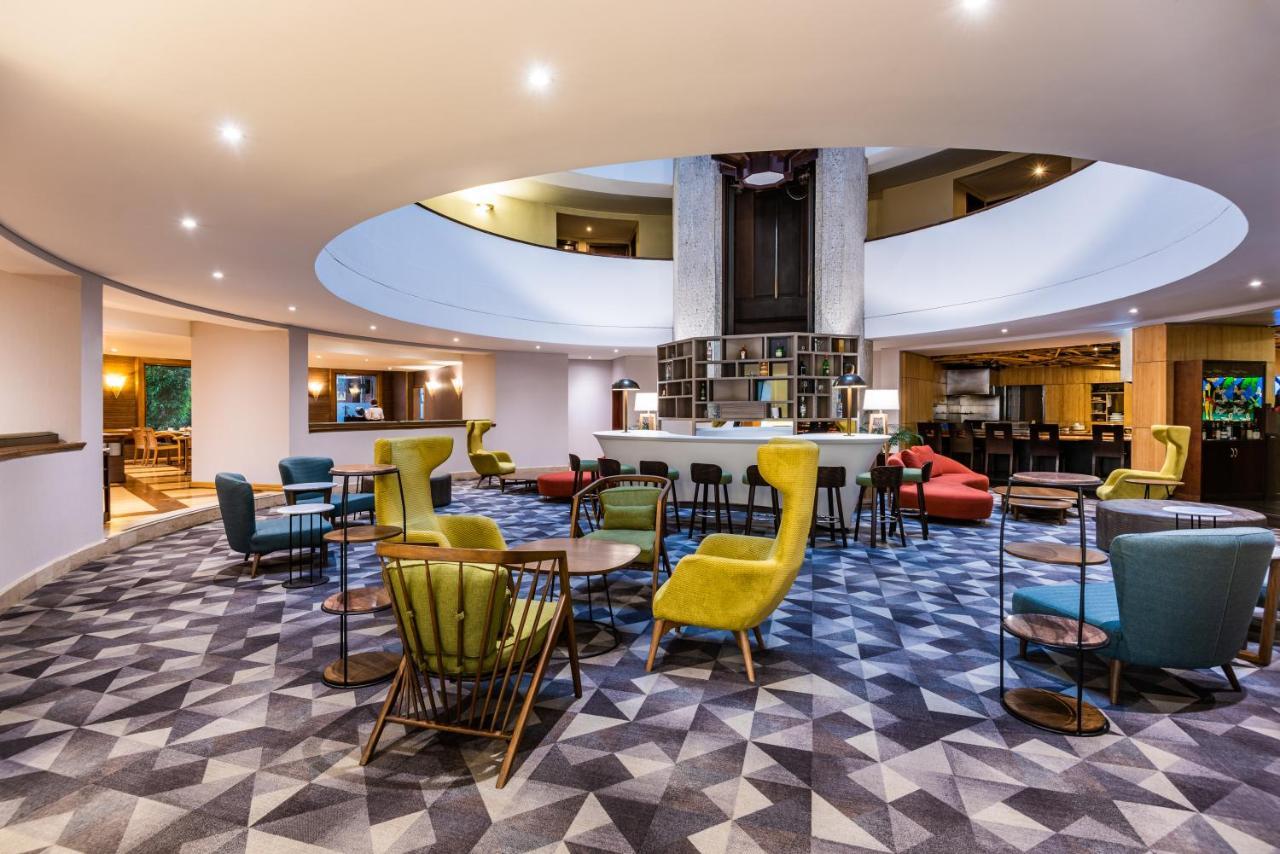 科斯莫斯100号酒店及会议中心 波哥大 外观 照片 The lounge at the hotel